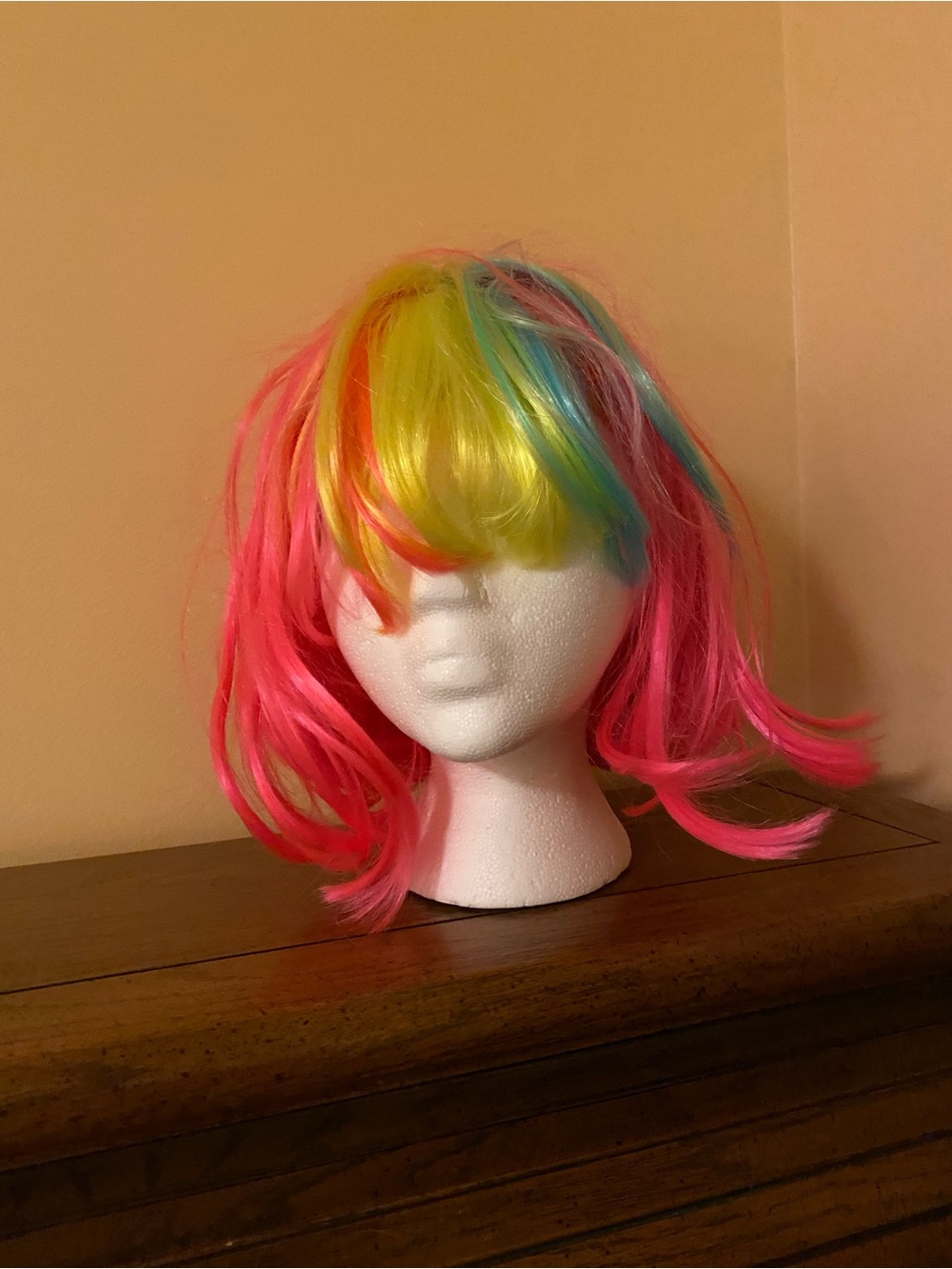 Bright Rainbow Pink Synthetic Wig with Yellow & Blue Highlights